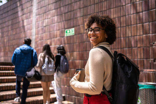 Young girl with backpack ready for study abroad